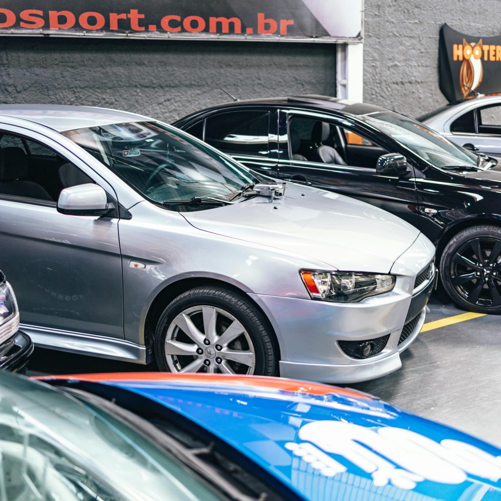 Buyer carefully inspecting a used car in Lahore Pakistan before purchase to ensure condition and reliability