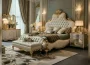 Premium wooden bed set with upholstered headboard and matching side tables in a modern bedroom